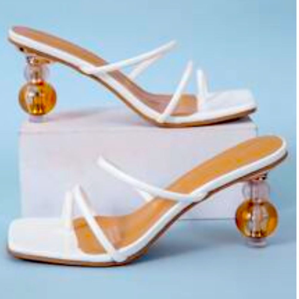 Strappy mule with unique heel
